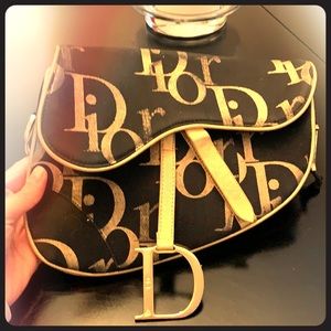 Dior gold and black clutch.